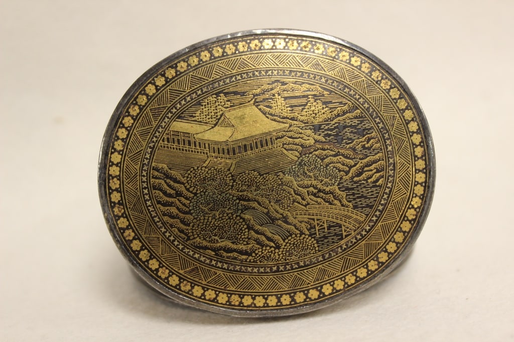 Exceptional Japanese Komai Ware Box: Japanese Komai ware box, an exceptional piece of damascened metalwork from the Meiji period (1868–1912). This specific item is a circular iron box, likely a trinket or pill box, decorated using