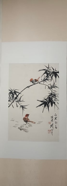 Chinese Ink and Color on paper Painting: The artwork depicts two sparrows (or similar songbirds) among bamboo. In Chinese culture, bamboo represents resilience and moral integrity, while small birds like sparrows often symbolize joy and