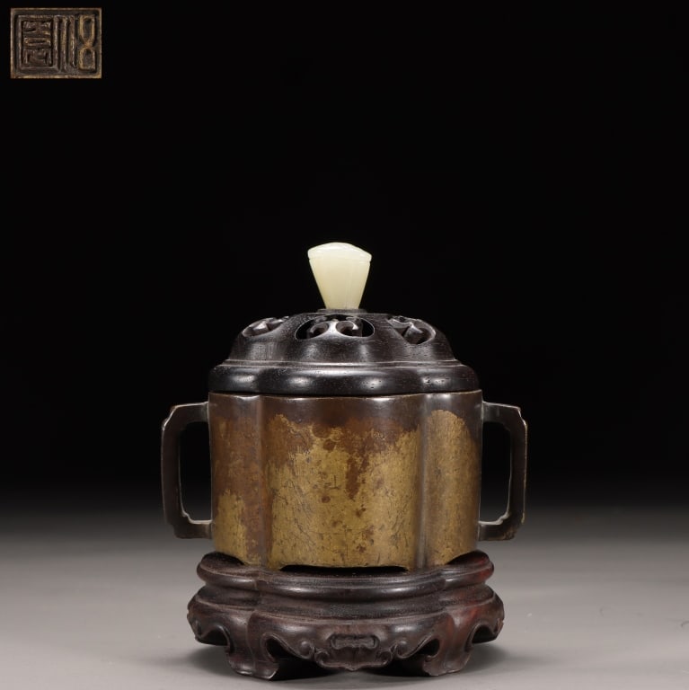 Chinese Gilt Bronze Incense Burner: Dimension: 10cm H x 8.8cm L x 6.3cm W,weight is 328gram . The censer is specific lobed quatrefoil design with double handles. It is topped with an ebonized hardwood cover (typically sandalwood)