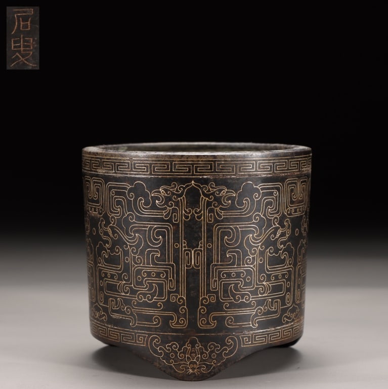 Chinese Cylindrical Silver-inlaid Incense Burner: Dimension: 8cm H x 8.6cm w,weight is719gram. The exterior is heavily decorated with archaic-style Kui dragon patterns (kuilongwen). These confrontational, stylized dragons are a