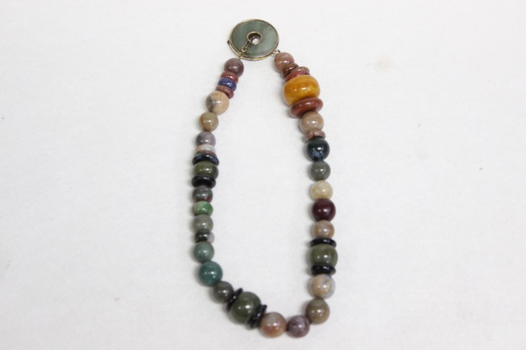 Multicolor Beaded Necklace: Dimension: 8 1/2"L The green and translucent beads with moss-like inclusions are consistent with moss agate, a form of chalcedony. This stone often comes in shades of green, white, and other