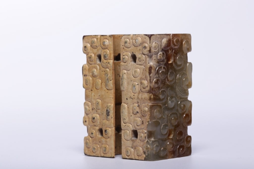 Chinese Archaic Jade Ritual Cong: Dimension: 3.5cm H x 2.7 x 1.8cm,weight is 32gram. The surface is densely covered with complex, stylized scrolling patterns often referred to as "curly cloud designs" or "Taotie" (animal mask)