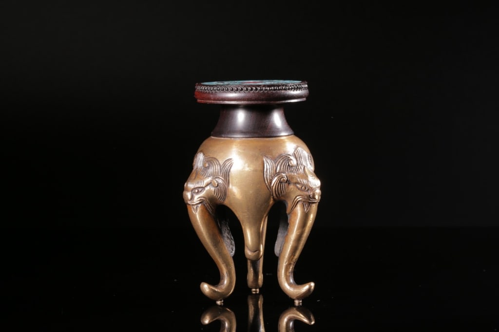 Chinese Footed Bronze Stand with Turquoise and Zit: Chinese Footed Bronze Stand with Turquoise and Zitan wood inlaid. Dimension: 9.2cm H x 5.8x 5.8cm,weight is 145gram. The stand is supported by three powerful elephant heads. In Chinese culture, the