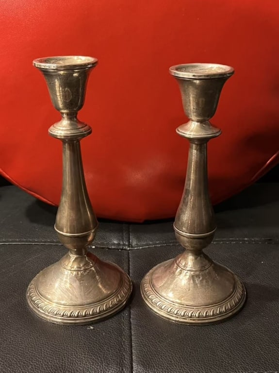 Pair of Weighted Sterling Silver Candle Stick: Dimension:8"H Crown Logo & "Crown", and "Weighted sterling"Mark. . This is the official maker’s mark for the Crown Silver Co.