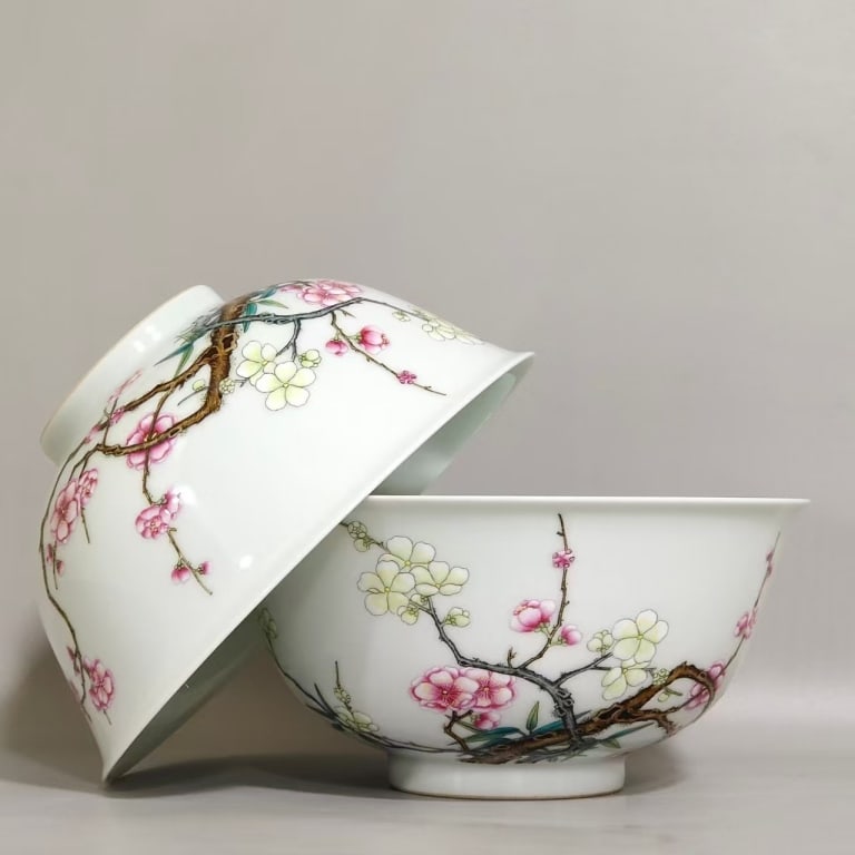 Pair Chinese Famille Rose porcelain Bowl,Mark: The exterior features hand-painted plum blossoms (Prunus) in pink and white. The other side of the bowl displays a calligraphic poem.The red square markings surrounding the text are painted seals.
