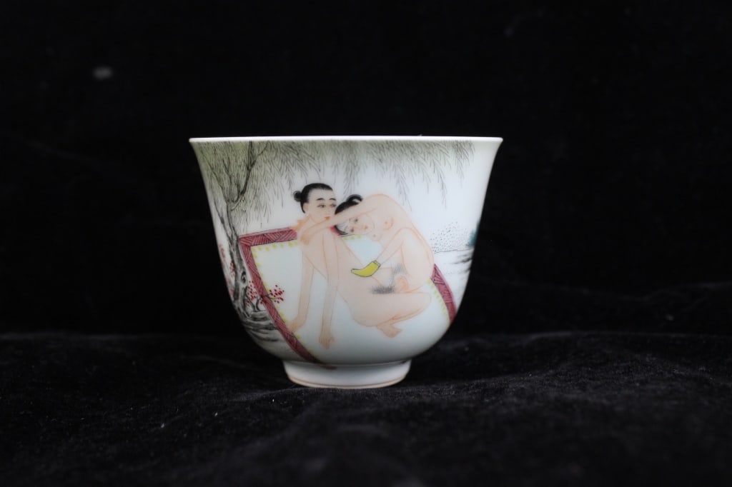 Chinese Famille Rose Erutic Subject Porcelain Cup,Mark: Dimension: 6.8cm Wfinely painted in the famille rose (fencai) palette. The exterior decoration depicts an intimate erotic scene (often referred to as "spring palace" (chun gong) imagery), showing two 