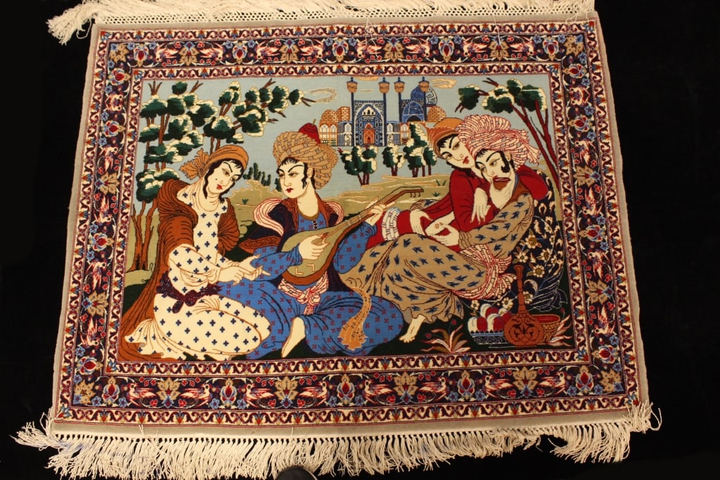 Isfahan Persian hand-knotted Pictorial Rug: Dimension: 32"x 42 1/2" The pictorial scene typically depicts a romantic or poetic Persian musical gathering, often inspired by the Rubaiyat of Omar Khayyam or other Safavid-era cultural narratives.It