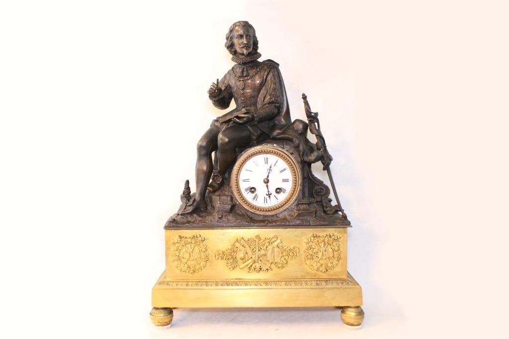 Antique French Bronze Figural Mantel Clock,19th.C: It features a patinated bronze figure and a gilded pedestal with ornate decoration Dimension: 12 1/4"x 4 1/2"x18"H. The timepiece typically features a white enamel dial with Roman numerals.