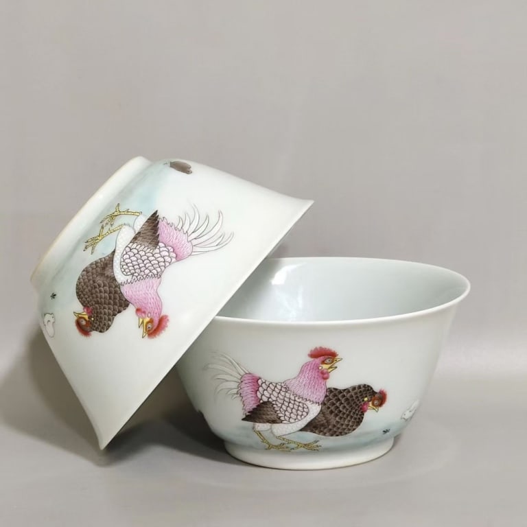 Pair of Chinese Famille Rose "chicken" cups,Mark: Pair of Chinese Famille Rose "chicken" cups,Mark. The "Chicken Cup" theme?featuring roosters, hens, and chicks?is a classic Chinese motif symbolizing a happy family life and fertility. Dimension :