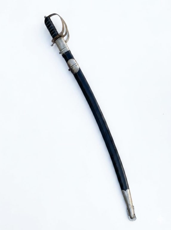 Indian-made curved military saber with Scabbard. (1 of 8)