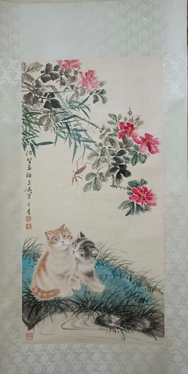 Chinese ink and color hanging scroll Painting: traditional Chinese ink and color hanging scroll painting depicting a charming scene of kittens, insects, and flowers. Dimension : 90x44cm. Two playful kittens rest on a grassy bank under a