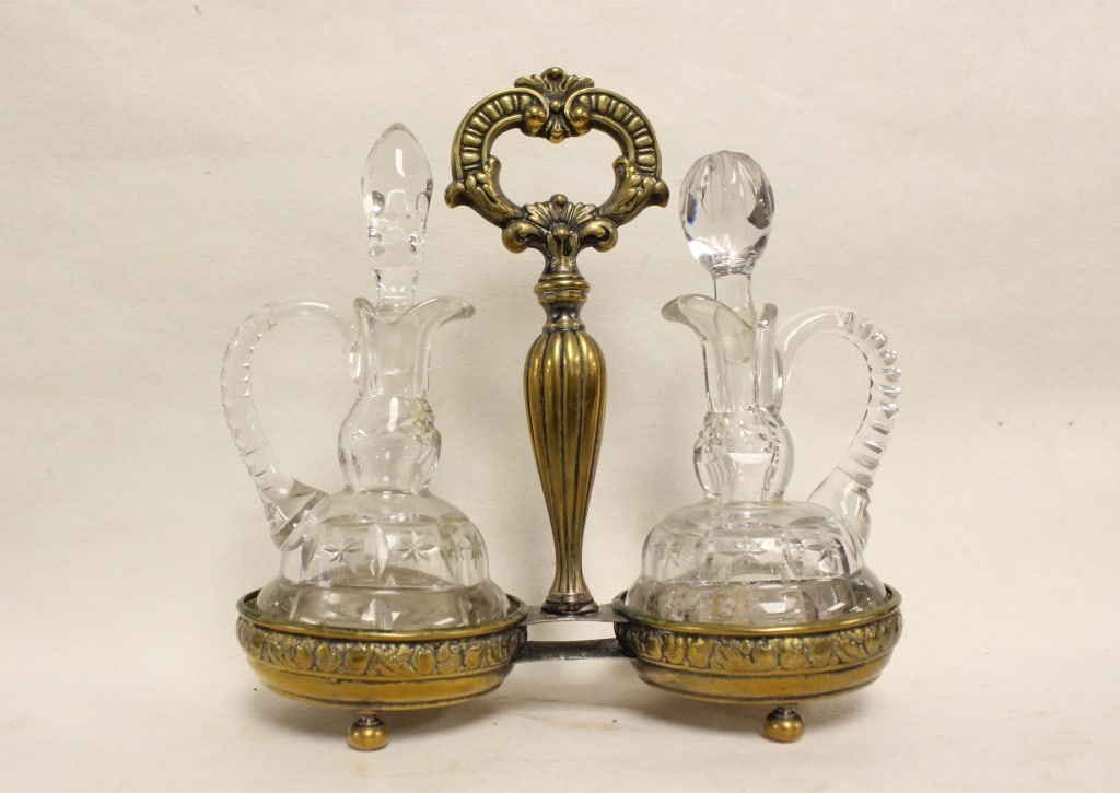 antique 19th-century oil and vinegar cruet set: antique 19th-century oil and vinegar cruet set, likely of French or English origin, designed in the Louis XVI or Neoclassical style. These sets were common fixtures on refined dining tables to serve e