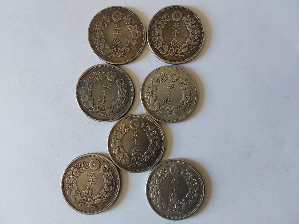 Antique 7 of Japanese Silver Coins 50 C . (1 of 8)