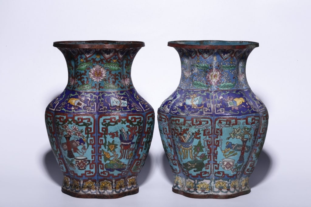 Pair of Chinese Cloisonn? Enamel Vases,Mark: Dimension : 26.7cm H x 20.5cm L x 11cm w The vessels feature a lobed, multi-faceted baluster form with prominent panels, a flared neck, and a matching lobed base.