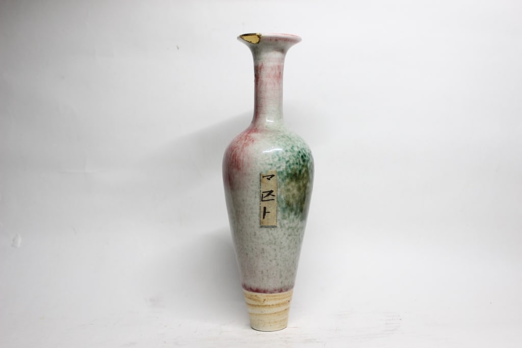 Chinese Slender and long-necked ceramic Vase,Mark: Dimension : 7 3/4"H . The body features a mottled, splattered glaze of pinkish-red, green, and white. The flared rim at the top shows a prominent chip that has been repaired using Kintsugi .