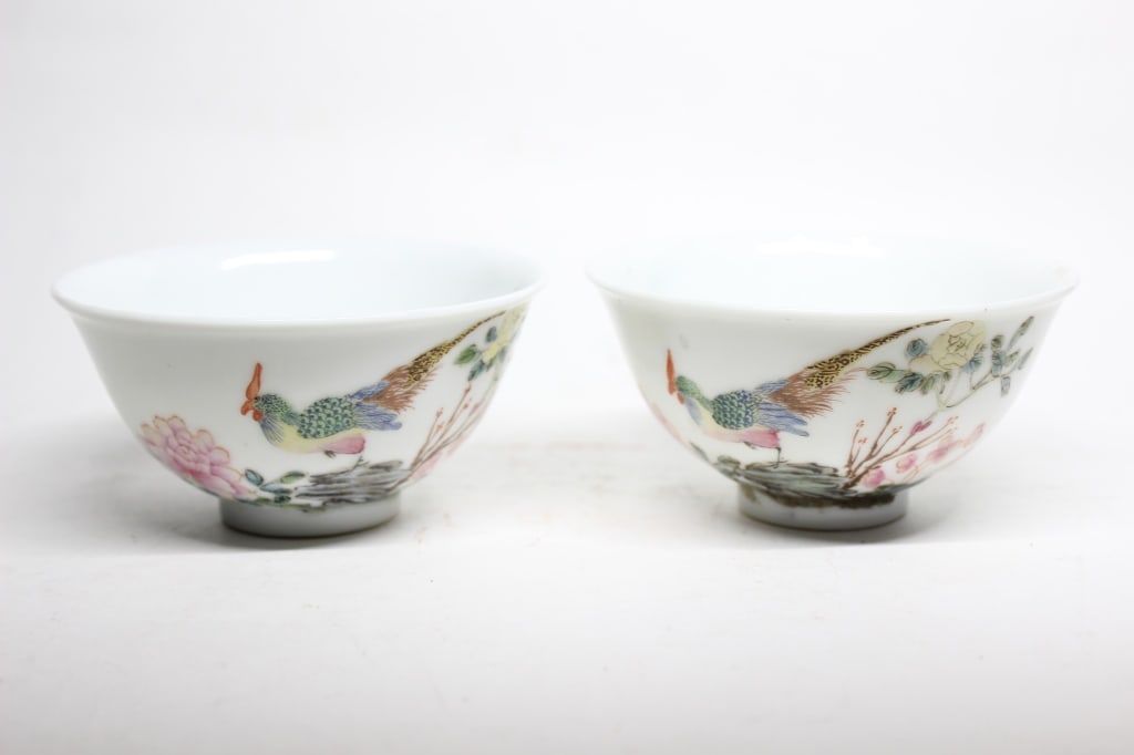 Chinese Famille Rose Porcelain Bowls,Pair: Dimension : 3 1/2"W. The imagery depicts the traditional Chinese artistic genre of "Birds and Flowers" (huaniao), symbolizing natural harmony, vitality, and prosperity.
