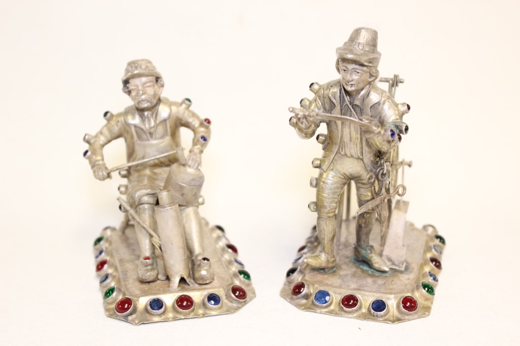 Antique continental silver figural miniatures w Se: Two antique continental silver figural miniatures with semi stones inlaid, likely representing traditional street vendors or tradesmen, heavily embellished with colorful gemstones. Dimension:4 3/4"H /