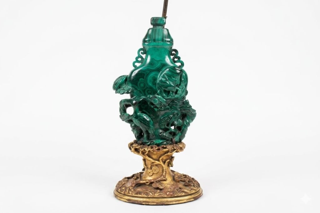 Chinese carved malachite covered vase Lamp: Dimension:26"H overall. an antique Chinese carved malachite covered vase, which has been converted into a table lamp. The vase features intricate, high-relief openwork carving characteristic of tradit