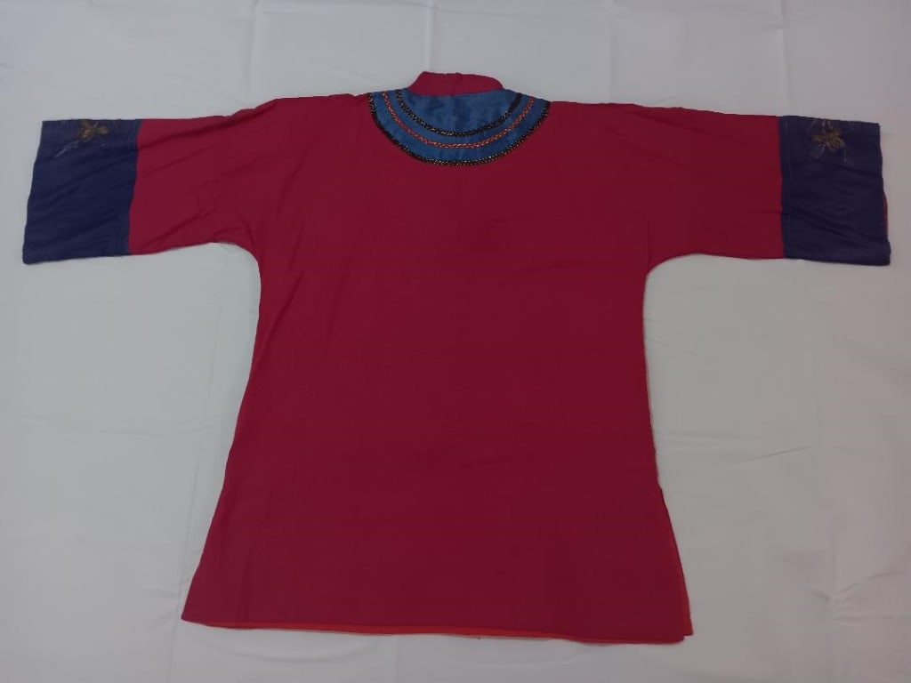 Antique traditional Chinese woman's robe jacket: Vintage Antique Chinese Silk Red Jacket Qing Dynasty Condition is great ! Dimension: 33.5 in. high, 51 in. wide. The main body is crafted from a rich, magenta-pink or fuchsia silk. The bright, saturat