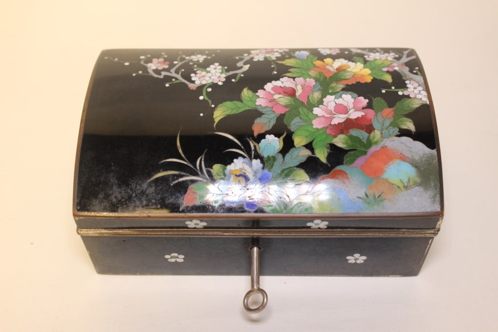 Antique Japanese Meiji period Cloisonne JewelryBox: containing personal ornaments . The cover displays large, multi-layered pink and white peonies (botan), traditionally symbolizing wealth, royalty, and honor in Japanese culture. The interior lid is li
