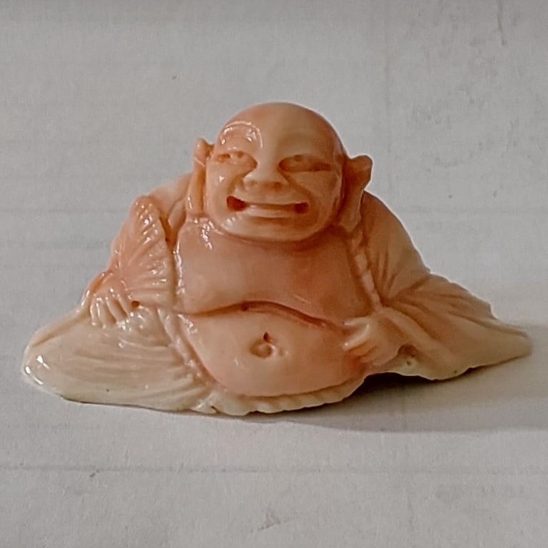 CHINESE RED CORAL CARVING MAITREYA BUDDHA.: CHINESE RED CORAL CARVING MAITREYA BUDDHA. W : 62 MM . H : 32 MM.