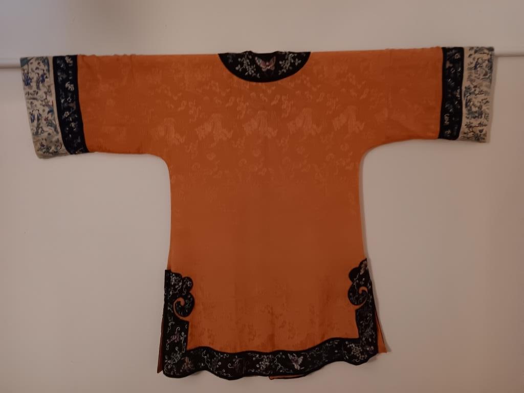 Antique 19th.C Chinese Silk Embroidered Robe: Antique 19th Chinese Robe Silk Embroidered H : 38 " X W : 53 " Very good condition. : The main body is crafted from an apricot-orange damask silk. The fabric features a subtle, self-patterned weave sh