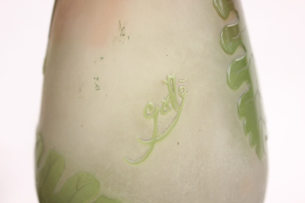 D'Argental and Gall? Art Nouveau cameo glass vases: Dimension:8"H/ 5"H. Left Vase is features a short, bulbous baluster body tapering down to a slender neck ring, resting on a wide, dark pedestal foot. Crafted with a frosted, matte citron-yellow to fie