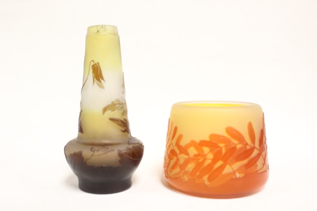 French Art Nouveau Galle cameo glass vessels: Dimension:5"H / 2 1/2"H. Left Vessel is Clematis or Anemone Bulbous Vase. A tall, tapering neck that swells into a wide, bulbous cushion base. Two layers of cameo glass featuring dark brown and olive-