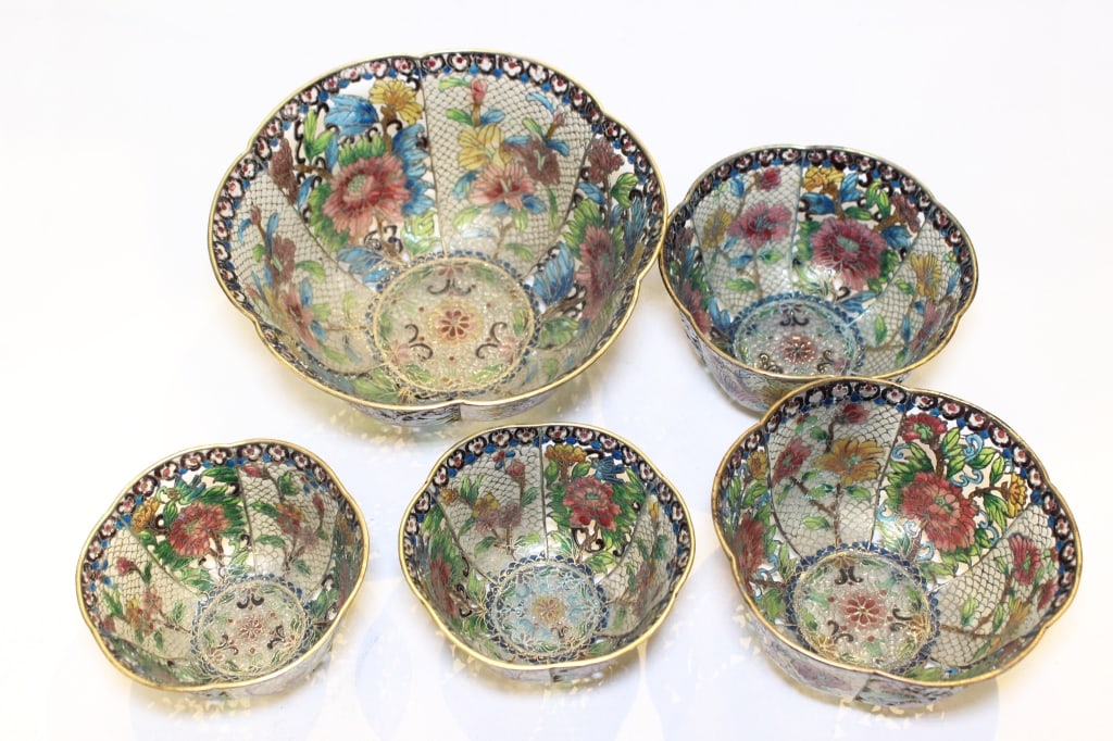 Five Chinese plique-?-jour enamel Bowls: These pieces feature various functional and decorative elements popular in mid-20th-century men's fashion. feature working miniature compasses or watch set in gold-tone or silver-tone circular housing