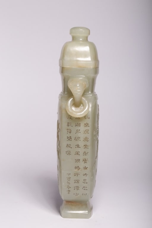 Chinese Carved Jade Vase with Cover and calligraph: Chinese carved jade vase with cover. Dimension: 19cm H x 8.5 x4.7cm,weight is 524gram. The vase is topped with a matching dome-shaped cover fitted with a circular knob finial. The lid is precision-gro