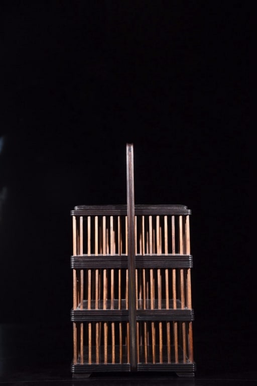 Chinese multi-tiered Zitan Wood carrying basket: Dimension: 20cm L x 20cm w x 38cm. The basket is built in a vertical, square three-tiered configuration. It consists of three independent, stackable interlocking compartments that fit tightly on top o