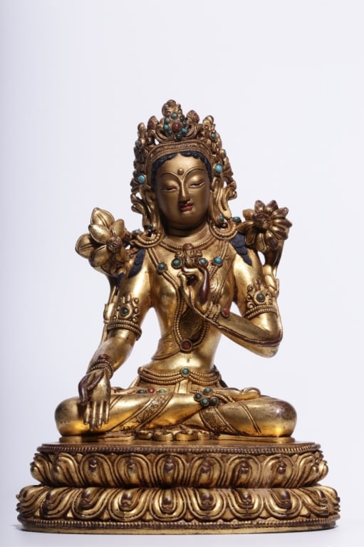 Chinese gilt bronze statue of Green Tara: Dimension: 19cm H x 13.5cm L x 9.5cm. weight is 1347gram. Tara is seated on a double-lotus pedestal in the posture of royal ease (Lalitasana). Her left leg is folded inward in meditation, while her ri