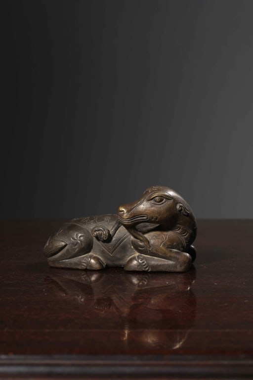 Chinese Bronze Paper Weight of Recumbent mythical: Chinese Bronze Paper Weight of recumbent mythical beast. Dimension: 9cm L x 5cm w x 5cm .