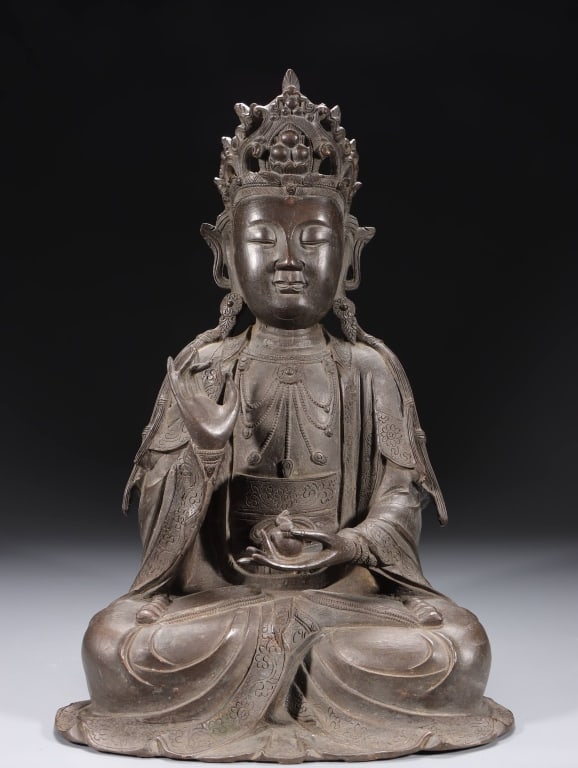 Chinese cast bronze statue of Guanyin: Chinese cast bronze statue of Guanyin, Ming style. Dimension: 36.8cm H x 24.5 x 19cm ,weight is 8150gram. Guanyin is seated in the full lotus position (Dhyanasana). Her left hand rests on her lap