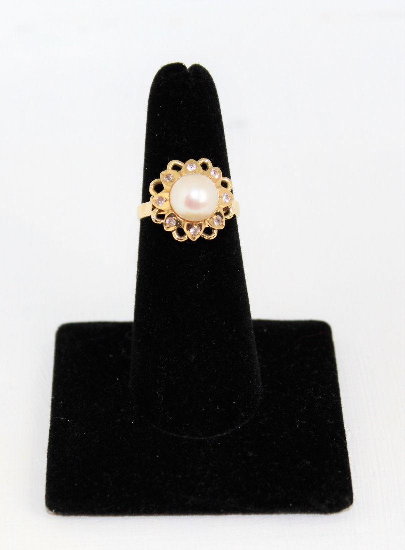 18K Gold Cultured Pearl White Spinel Cocktail Ring: Vintage 18K Yellow Gold Cultured Pearl White Spinel Cocktail Ring 5 grams Size 6 Gold: 18k Yellow Gold, marked 18K Details: Vintage 18k yellow gold pearl cocktail ring, surrounded by small 2 mm each w