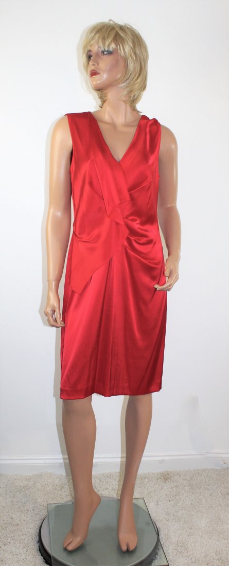 Donna Karan DKNY Red Satin Cocktail Dress Size 12: Donna Karan DKNY Red Satin Ruched Cocktail Dress in a Size 12. This is a recent design, made of Triacetate and Polyester blend. There is a back zipper. The measurements are: bust 38", waist 32", and h