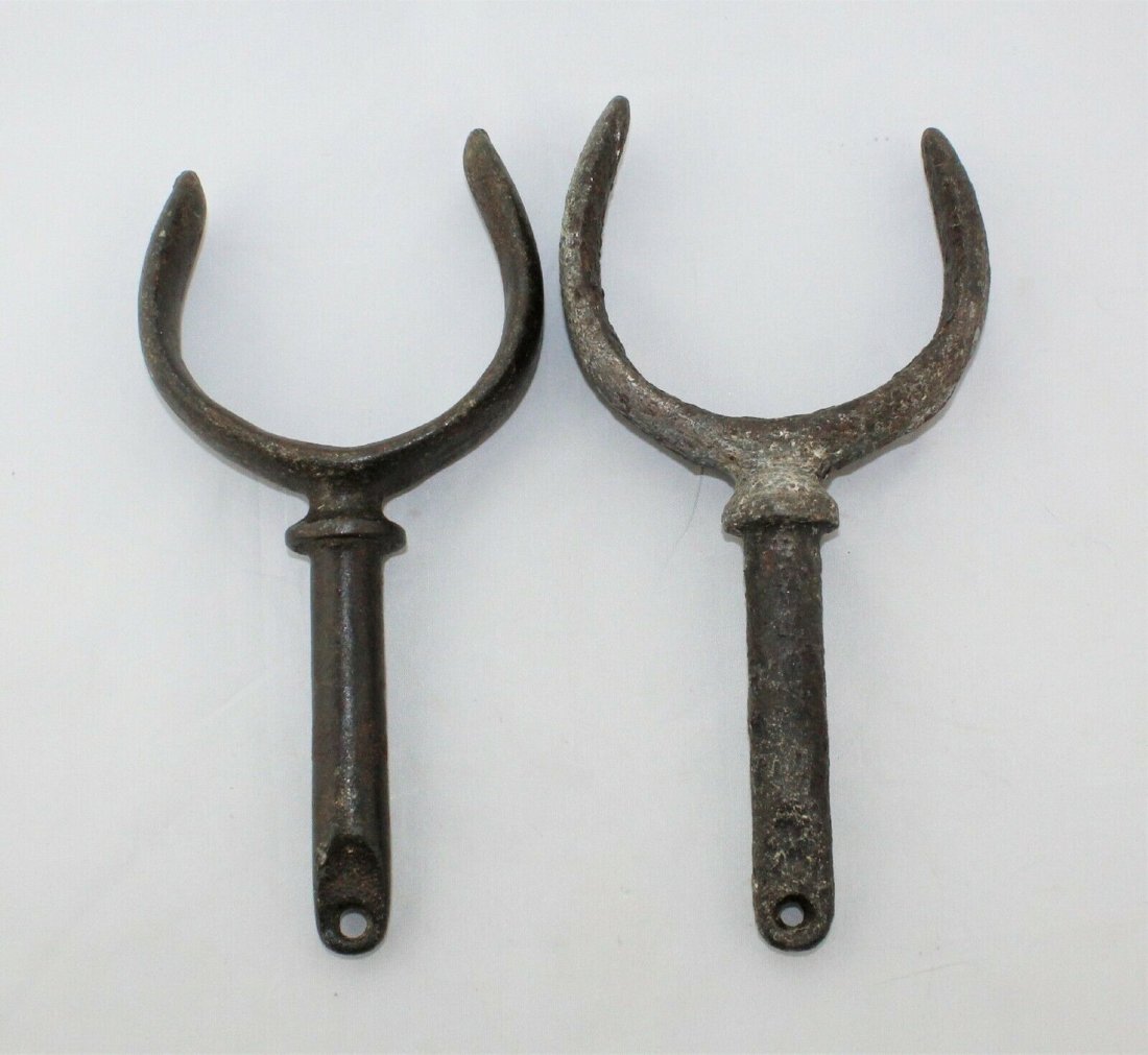 Antique Boat Oar Locks - Cast Iron: Antique Vintage Boat Iron Oar Locks. Measurements: Width: 4 1/4", (lock #1), 4" (lock #2). Length: 8" (lock #1), 7 3/4" (lock #2), Opening: 3" (lock #1), 2 5/8" (lock #2).