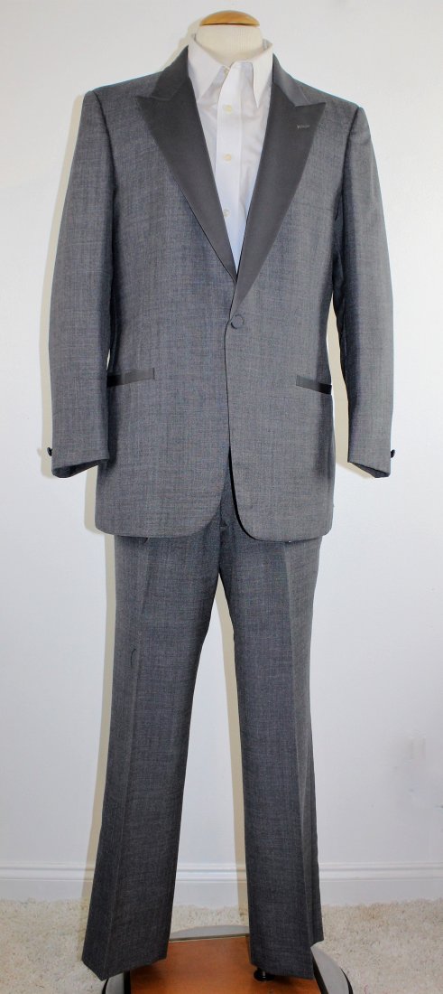 Vintage Men's Tuxedo Suit by Pierre Cardin 44R: Details: Men's Vintage 80's Pierre Cardin Gray Tuxedo Suit in a size 44R. There is a single button closure jacket, fully lined. 3 front pockets & 2 interior pockets. Pants, have a satin stripe along t