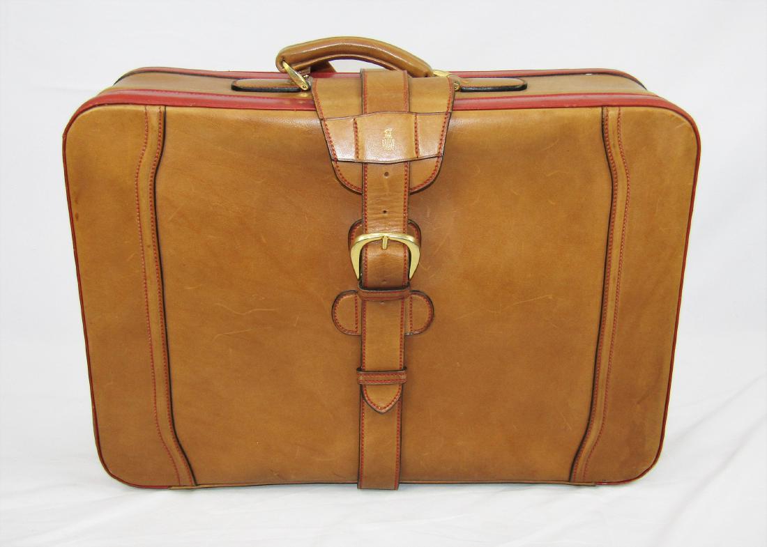 MARK-CROSS-Butterscotch-Brown-Leather-Suitcase: MARK CROSS Butterscotch Brown Leather Red Trim Suitcase 21.5" x 17" x 8". BRAND: Mark Cross. MATERIAL: Leather. ORIGIN: Italy. MEASUREMENTS: Width: 21 1/2", Height: 17 1/2" (including handle), Depth: