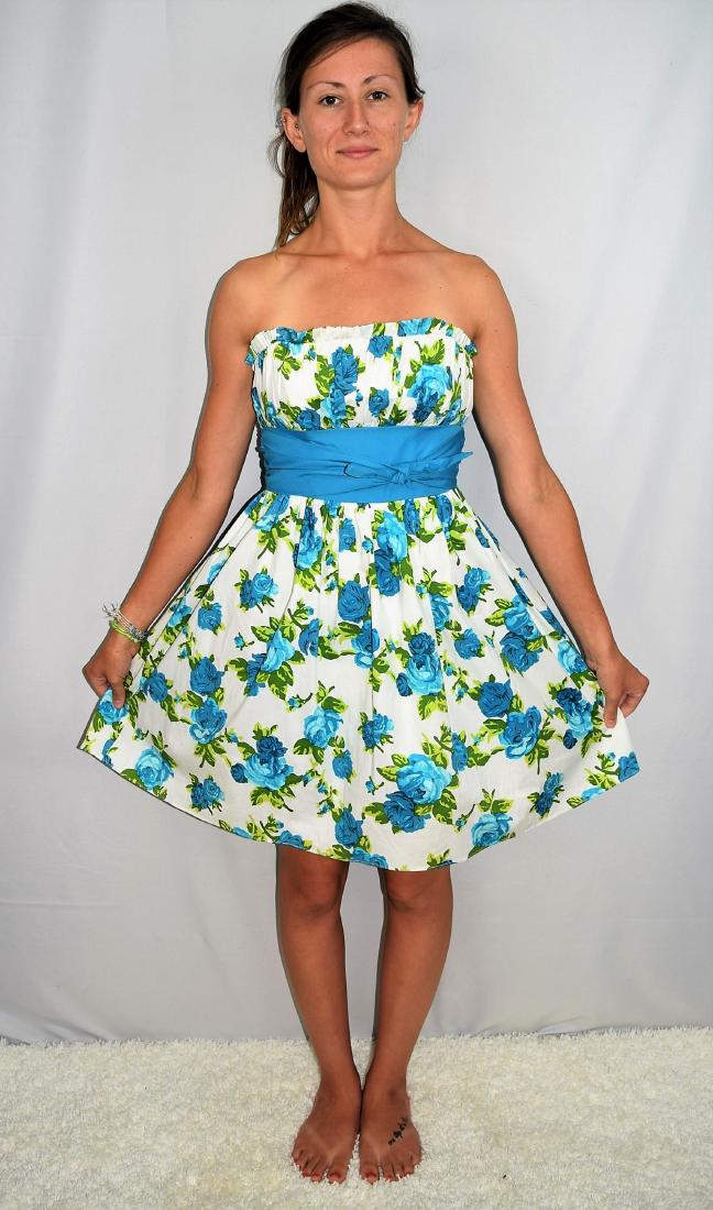 Betsey Johnson Floral Strapless Swing Dress: Beautiful Betsey Johnson Floral Strapless Swing Dress in a Size 6. The 3 layer dress is made of 97% cotton and 3% spandex. There is a back zipper. The full skirt measures 78" around at the hem, has a 