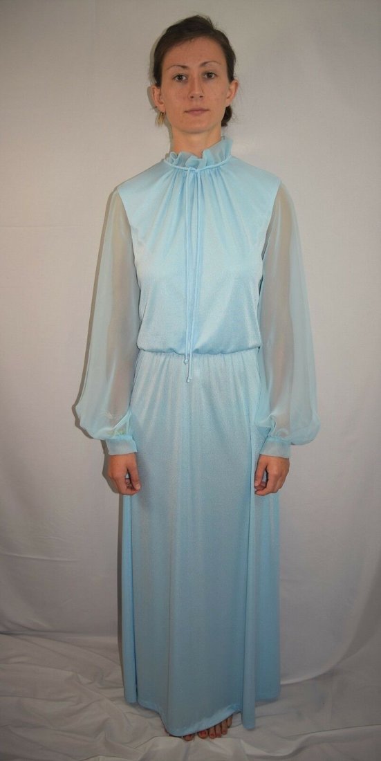 Vintage 70's Emma Domb Mother of the Bride Dress: Vintage 70's Emma Domb light blue polyester Mother of the Bride Dress with sheer sleeves, an elastic waist, sleeve cuffs with metal snaps, a back zipper and front neck tie. Marked size 6, has an old s