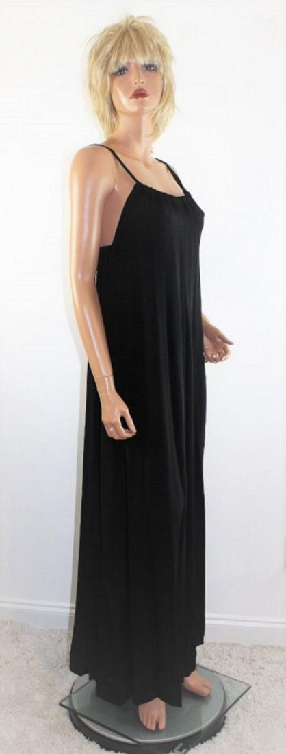 Vintage Gil Aimbez Maxi Halter Dress: Vintage 1970's black rayon halter dress labeled Genre by Gil Aimbez. Marked vintage size 8, but may better fit a smaller size. There is a row of elastic across the back, which allows the bust to fit 3