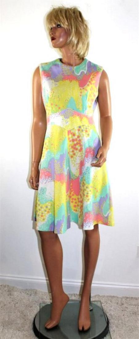 Vintage 60's Mod Poly Dress by Parkshire: Vintage 60's colorful polyester double knit dress by Parkshire. This psychedelic print dress should fit Medium sizes, with 38" Bust, 29" waist and 39" length.
