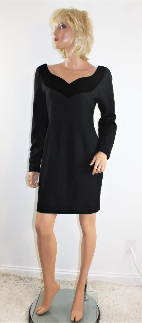 Arnold Scaasi Black Dress Size 6: Arnold Scaasi Black Office to cocktail Dress Size 6. The shell is wool trimmed with velvet and the lining is an acetate and rayon blend. Zipper down back. Made in USA.
