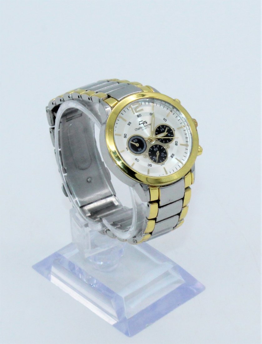 CHARLES RAYMOND Men's Quartz Gold Silver Plate Watch: CHARLES RAYMOND Men's Quartz Gold Silver Plate Stainless Steel Watch - It Works. Condition: Great condition, working condition.. Measurements: Width: 5/8" (band), 1 3/8" (watch), Length: 7 1/4" (insid