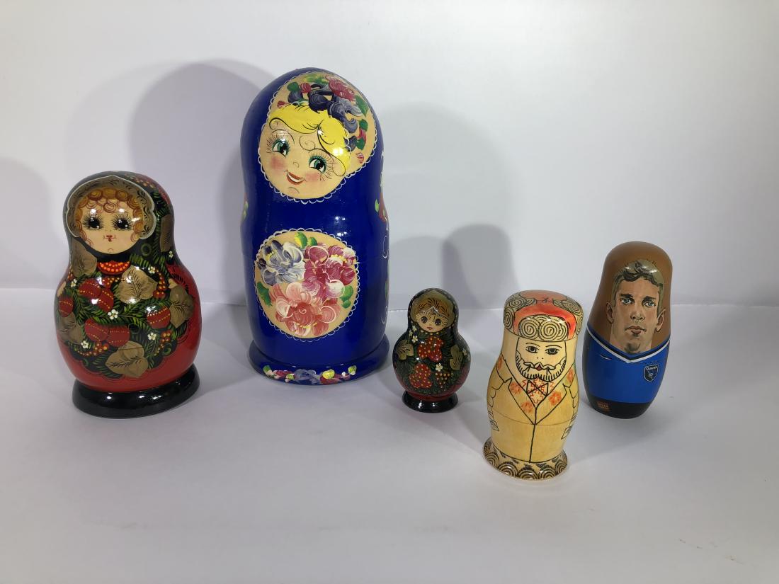 Lot of 5 Wood Nesting Dolls: Lot of 5 Wood Nesting Dolls. as shown. Tall doll approx 10" tall.