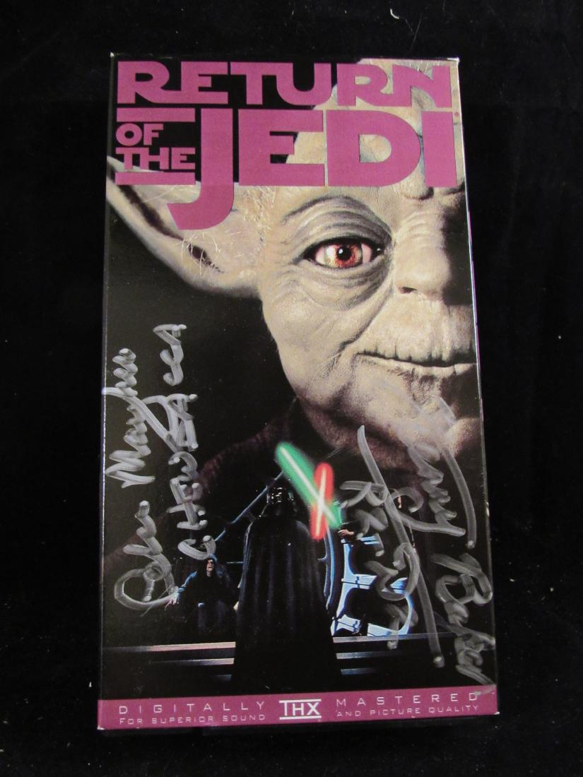 "Return of the Jedi" VHS in box autograph: The box was hand signed at a "Star Wars"convention in New Jersey by actors Peter Mayhew (who played"Chewbacca), and Kenny Baker (who portrayed the droid R2-D2).