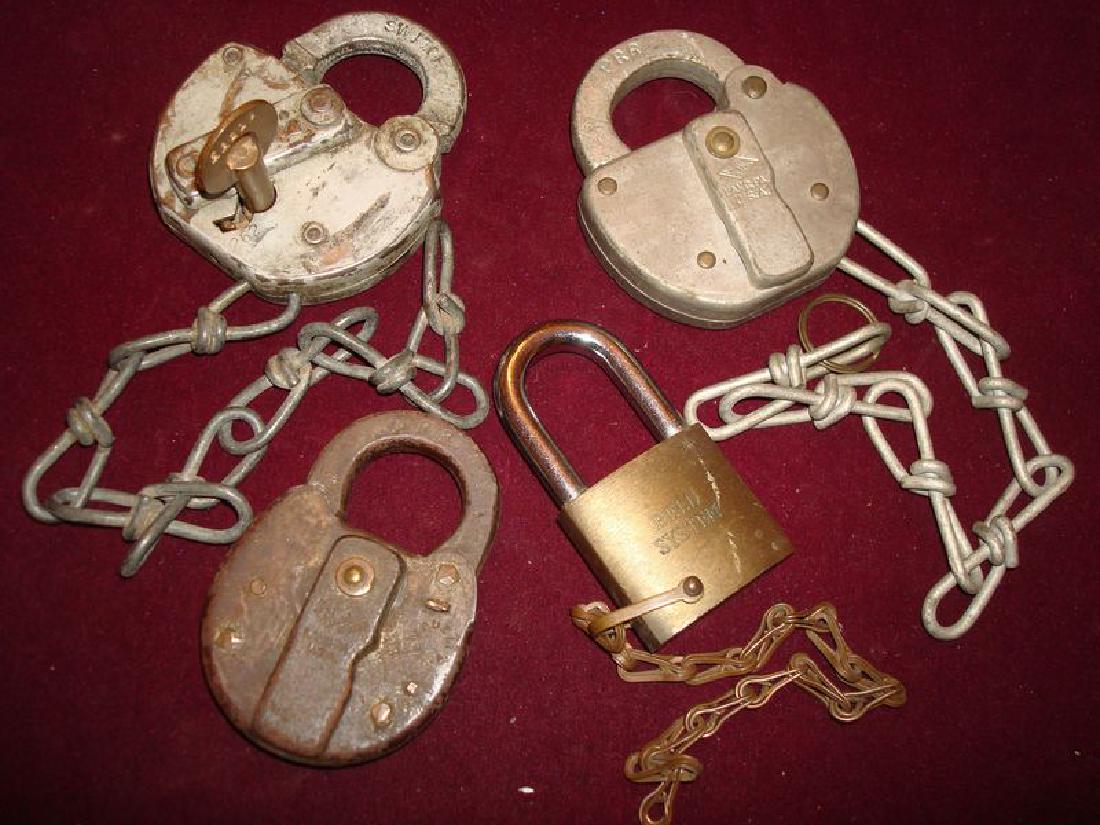 4 antique locks:3-RR & Bell tel.: 1 brass, 1 steel Pennsylvania Railroad switch locks 1 dated 1968, 1 Adlake switch lock in gray paint with brass key, key and lock is marked MOPAC LINES, key is marked MOPAC-Missouri-Pacific. Lot also