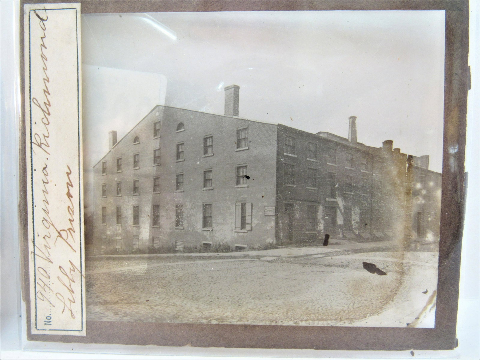 Libby Civil War Confederate prison 2 early items: Libby Prison (Richmond, Virginia) Civil War Confederate prison early magic lantern slide and post card.
