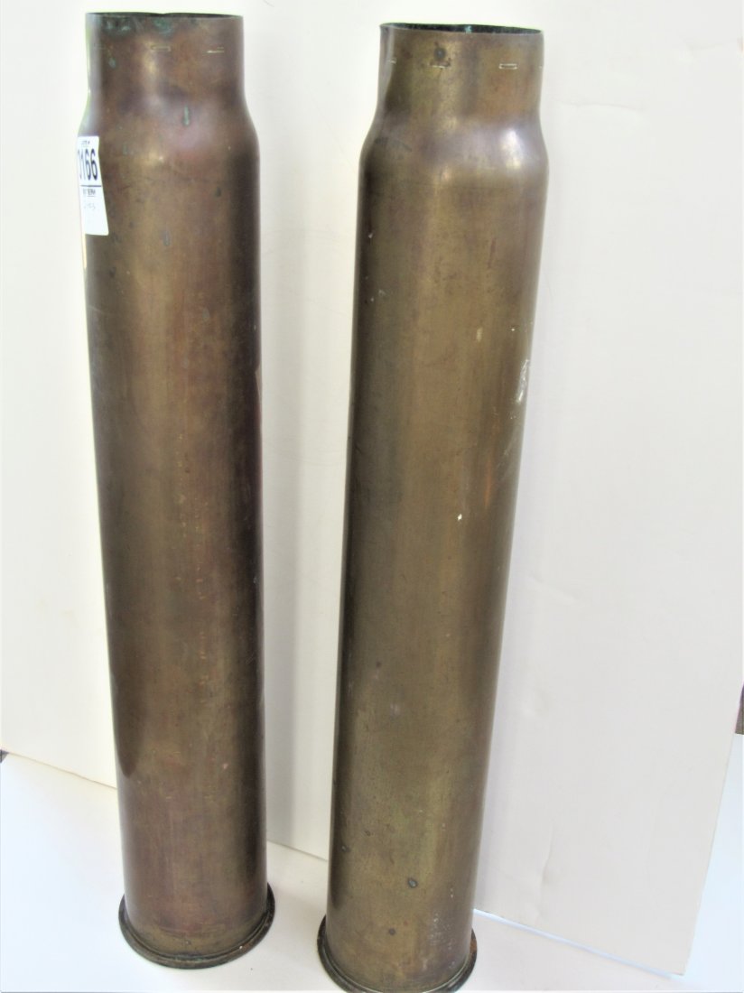 2-Large WWII Artillery shells: 23" tall, 1.25" base diameter, dated 1943 lot # 344, SMC,3 in mk7-mod, 1.US NAVY HDH is stamped on the bottom.